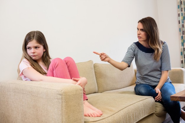 daughter-ignoring-her-mother-after-argument-living-room_1170-2690